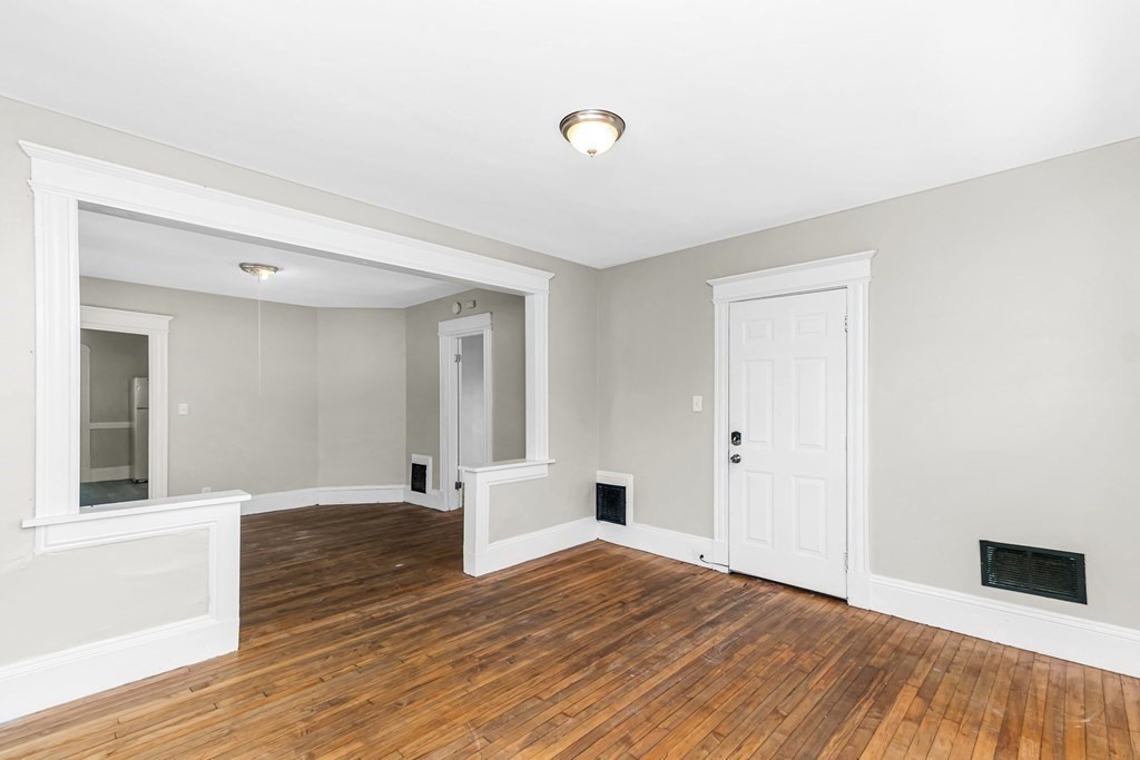 335 Oakland Street Springfield, MA 01108 - Photo 34 of 42 a view of empty room with wooden floor