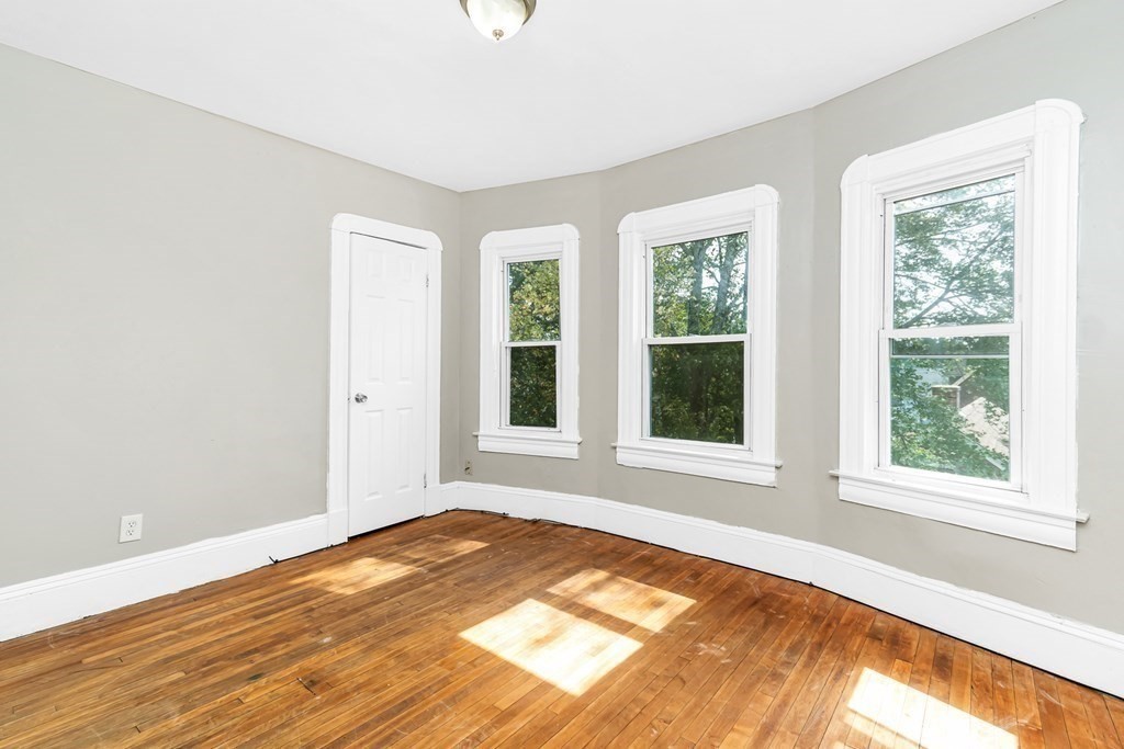 335 Oakland Street Springfield, MA 01108 - Photo 37 of 42 a view of an empty room with a window
