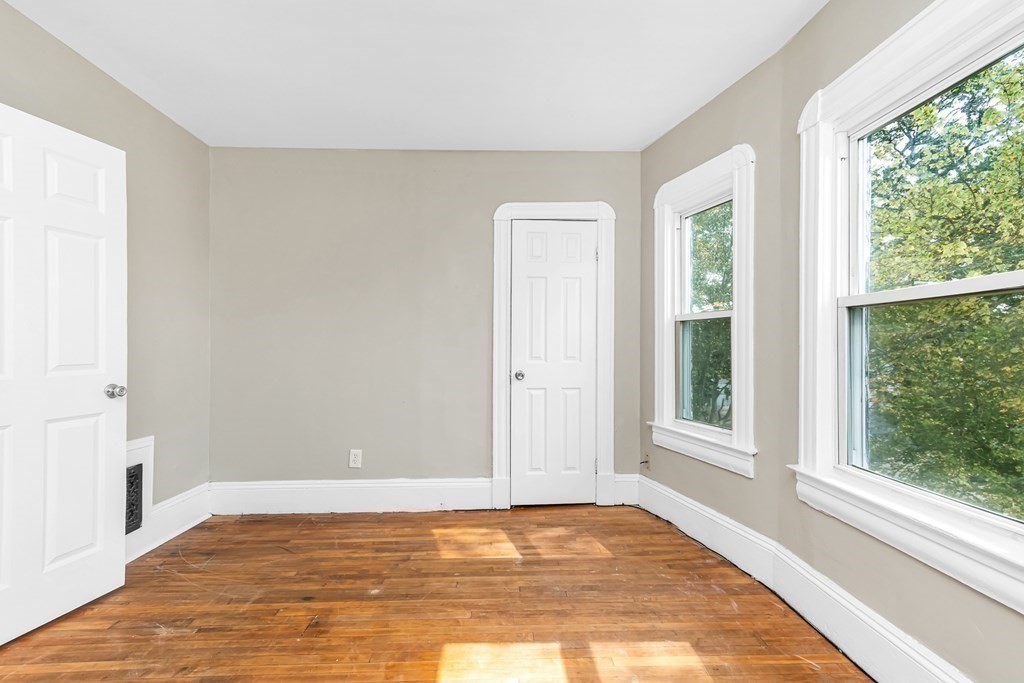 335 Oakland Street Springfield, MA 01108 - Photo 38 of 42 a view of an empty room and window