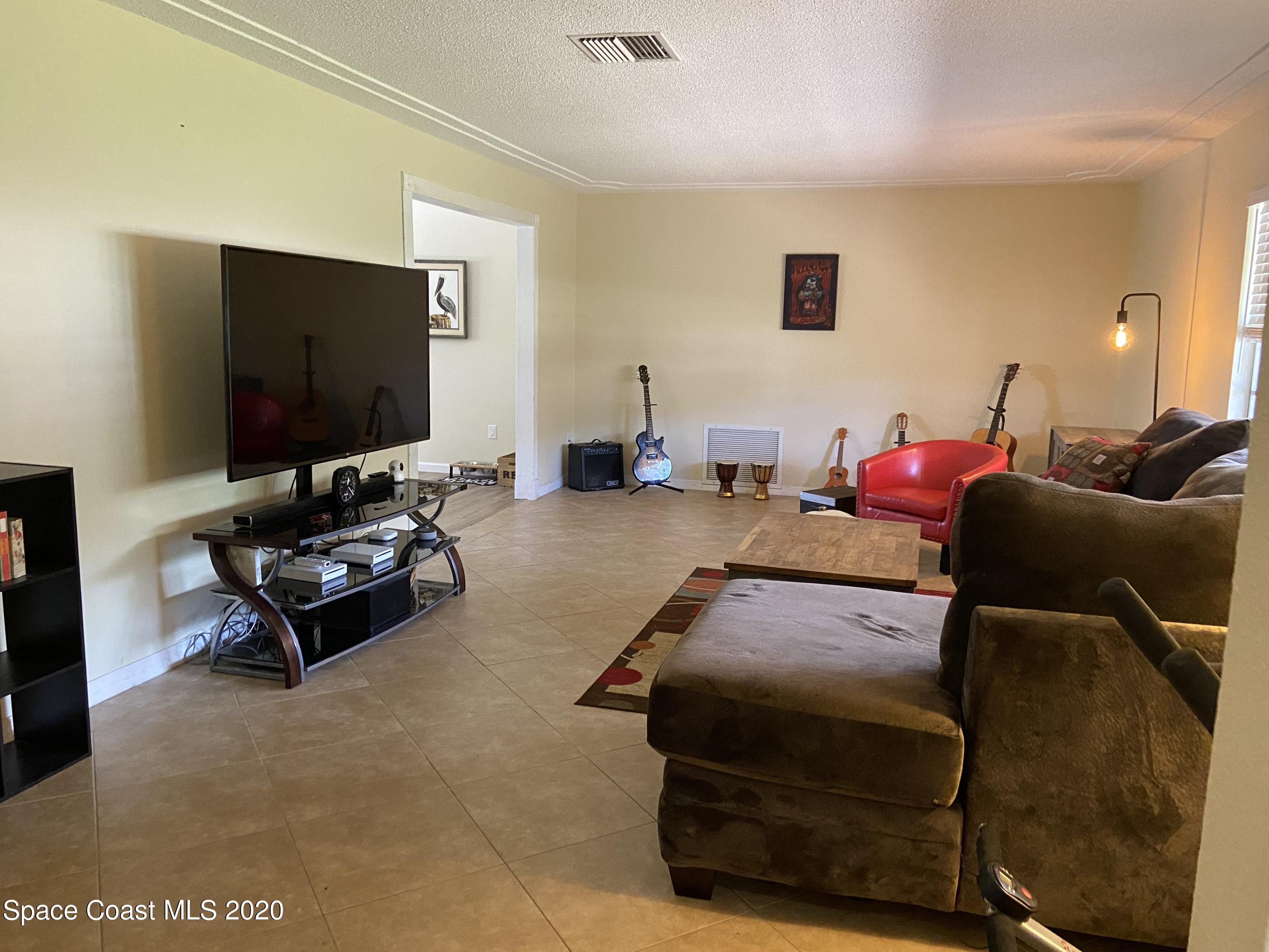 1237 Cimarron Circle Northeast Palm Bay, FL 32905 - Photo 4 of 28 IMG_1177