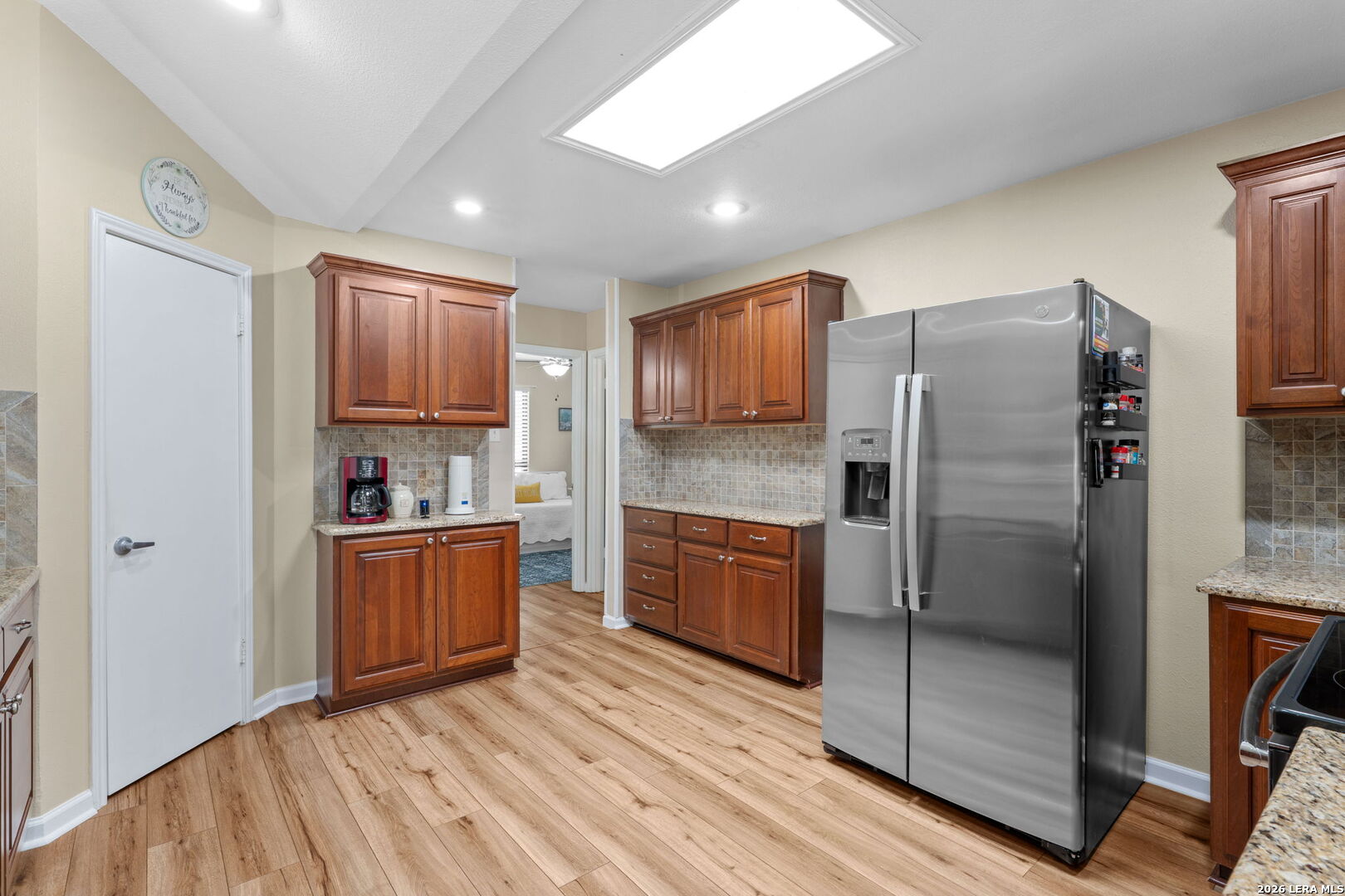 2501 Newning Schertz, TX 78154 - Photo 14 of 28 a kitchen with stainless steel appliances granite countertop a refrigerator and a stove top oven