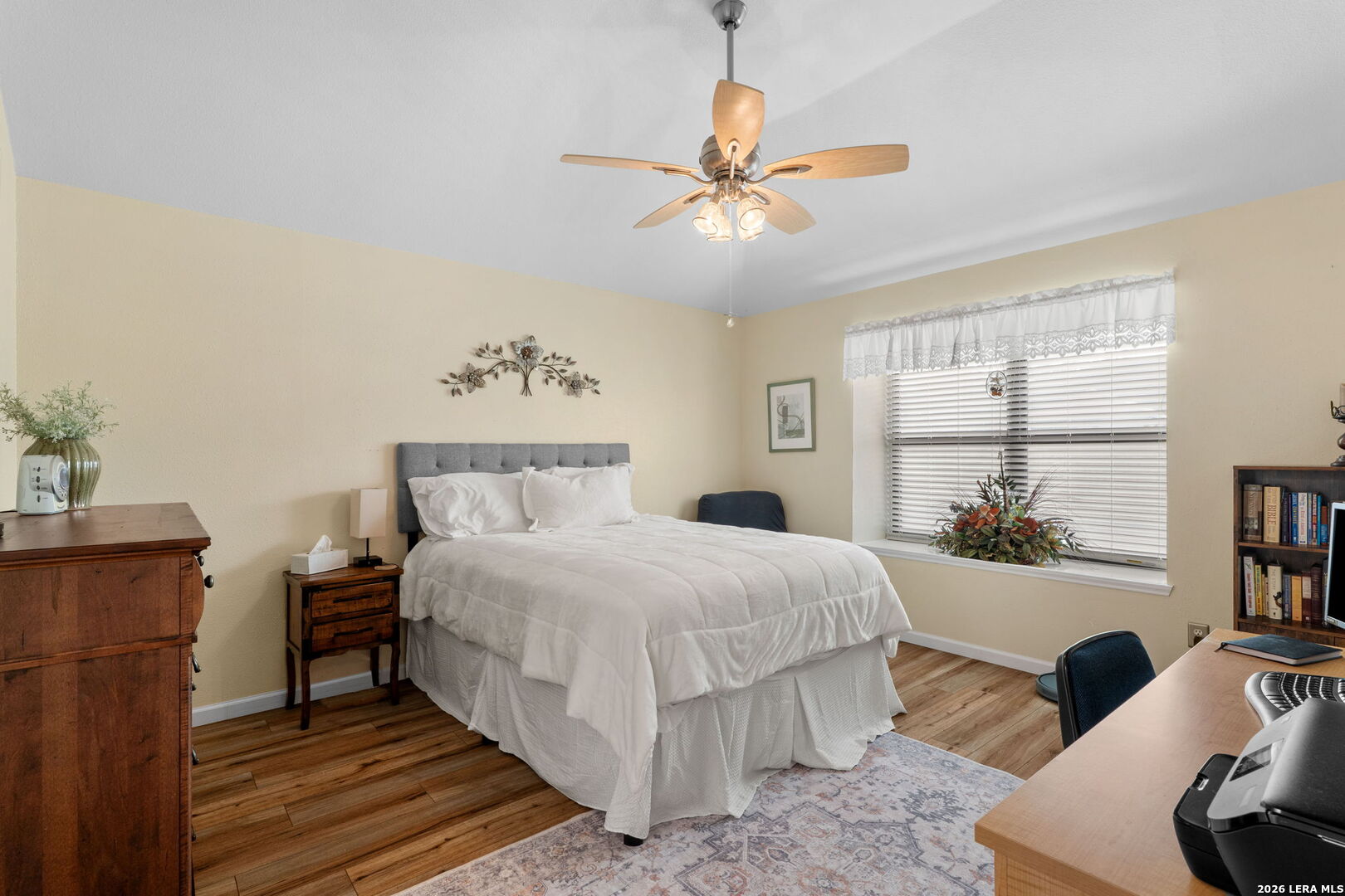 2501 Newning Schertz, TX 78154 - Photo 16 of 28 a bedroom with a bed and a chandelier