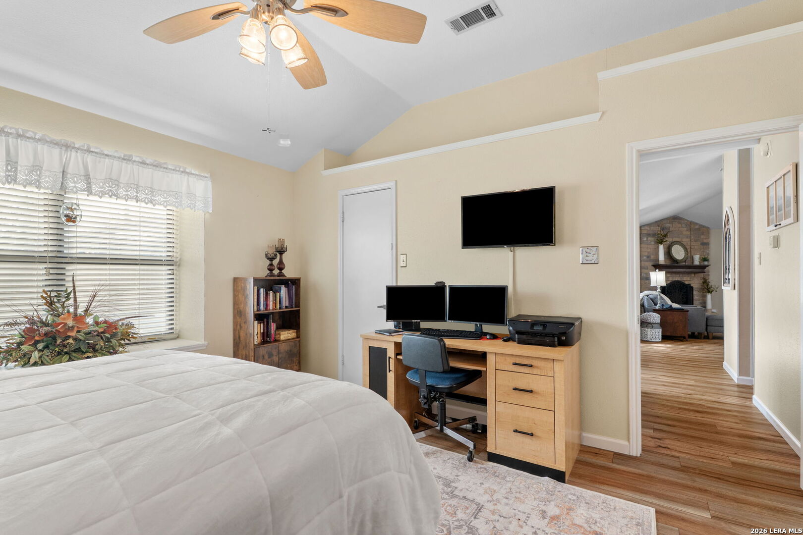2501 Newning Schertz, TX 78154 - Photo 17 of 28 a bedroom with a bed and a flat screen tv