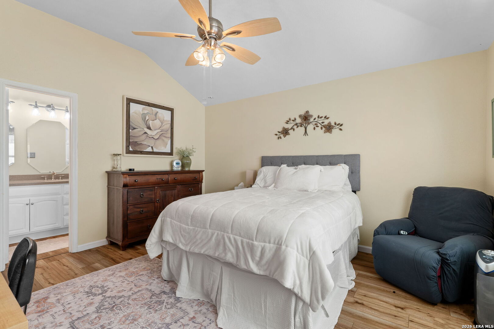 2501 Newning Schertz, TX 78154 - Photo 18 of 28 a bedroom with a bed and a chandelier