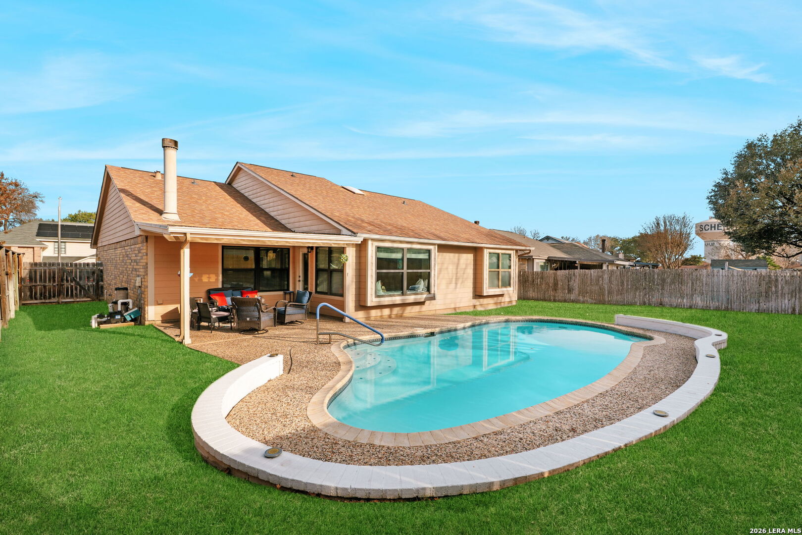 2501 Newning Schertz, TX 78154 - Photo 2 of 28 a view of a house with swimming pool and a yard