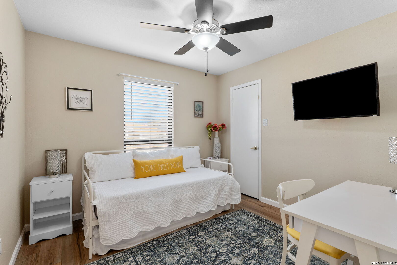 2501 Newning Schertz, TX 78154 - Photo 6 of 28 a bedroom with a bed and a flat screen tv