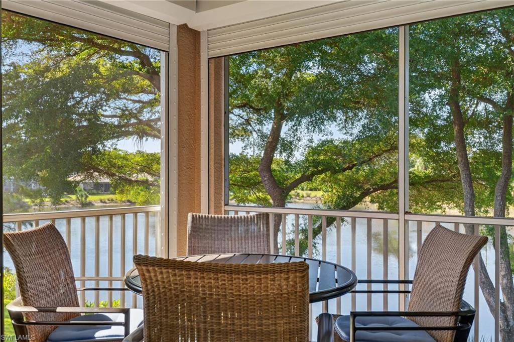 7092 Timberland Circle, Unit 201 Naples, FL 34109 - Photo 2 of 43 a view of a two chairs in the deck