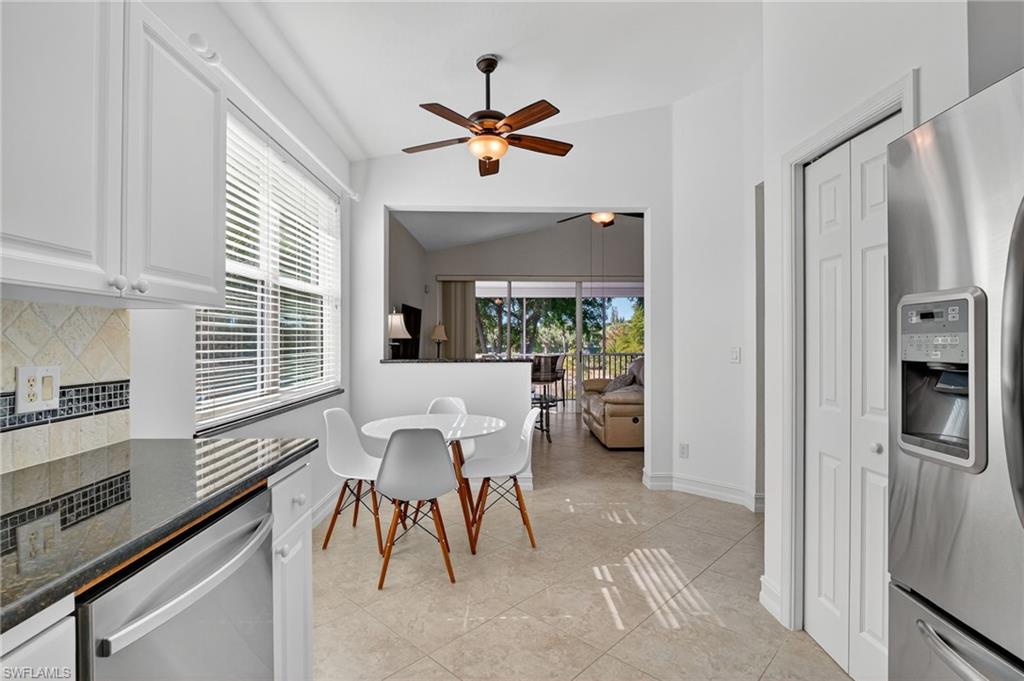 7092 Timberland Circle, Unit 201 Naples, FL 34109 - Photo 37 of 43 a view of a livingroom with furniture and a ceiling fan