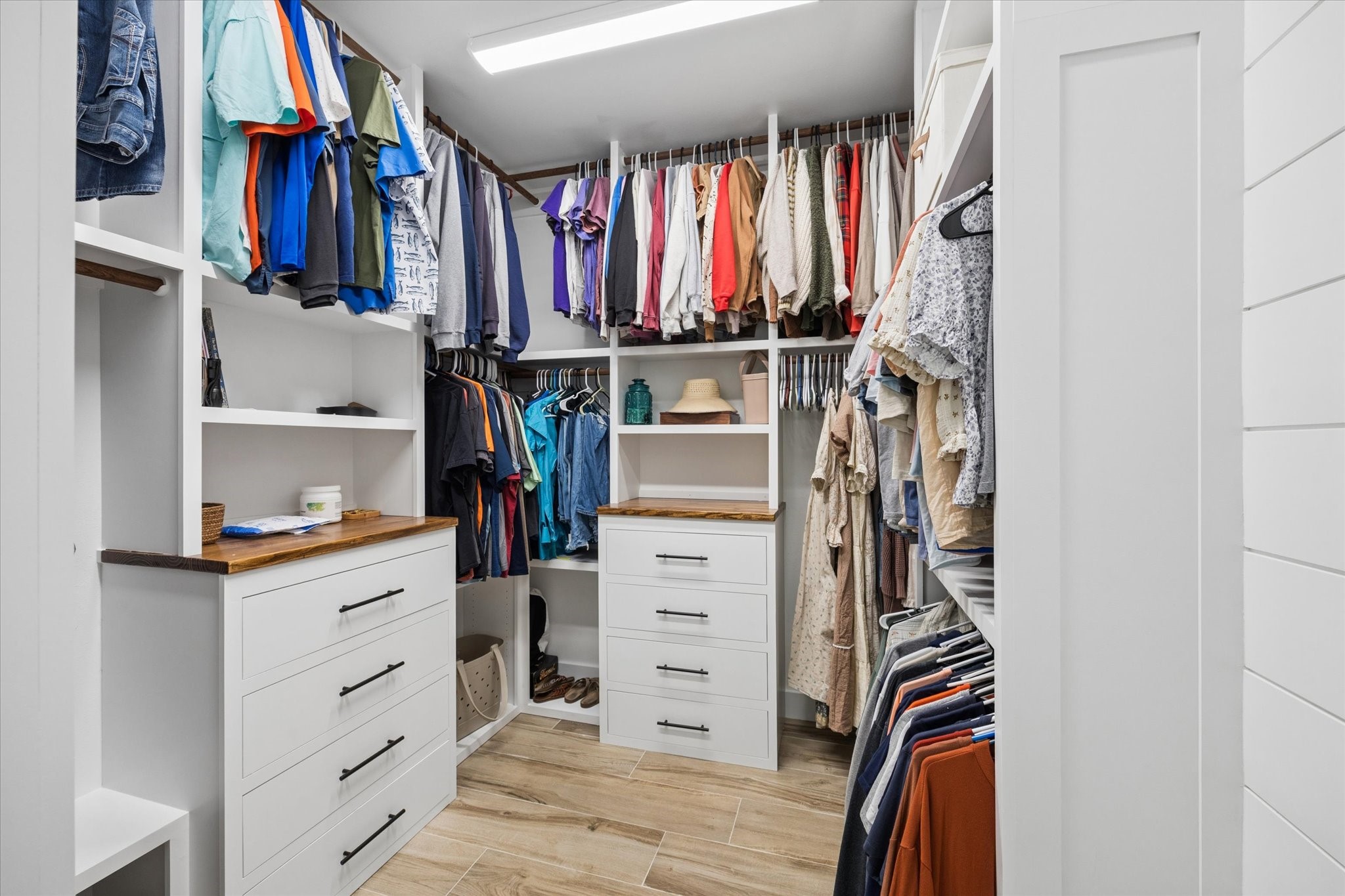 5131 Timber Ridge Drive Sealy, TX 77474 - Photo 29 of 50 Primary closet that has ample room and custom built ins.