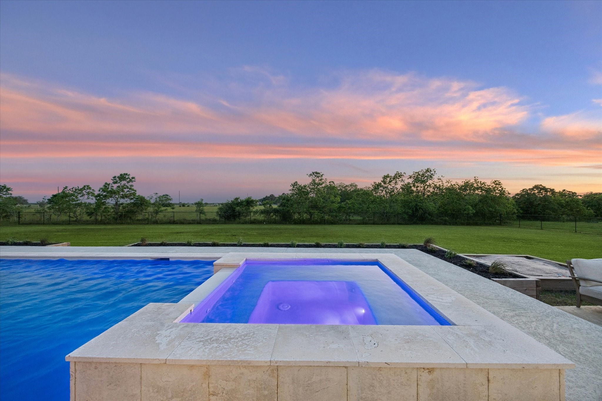 5131 Timber Ridge Drive Sealy, TX 77474 - Photo 42 of 50 Luxurious outdoor pool with an adjoining spa.