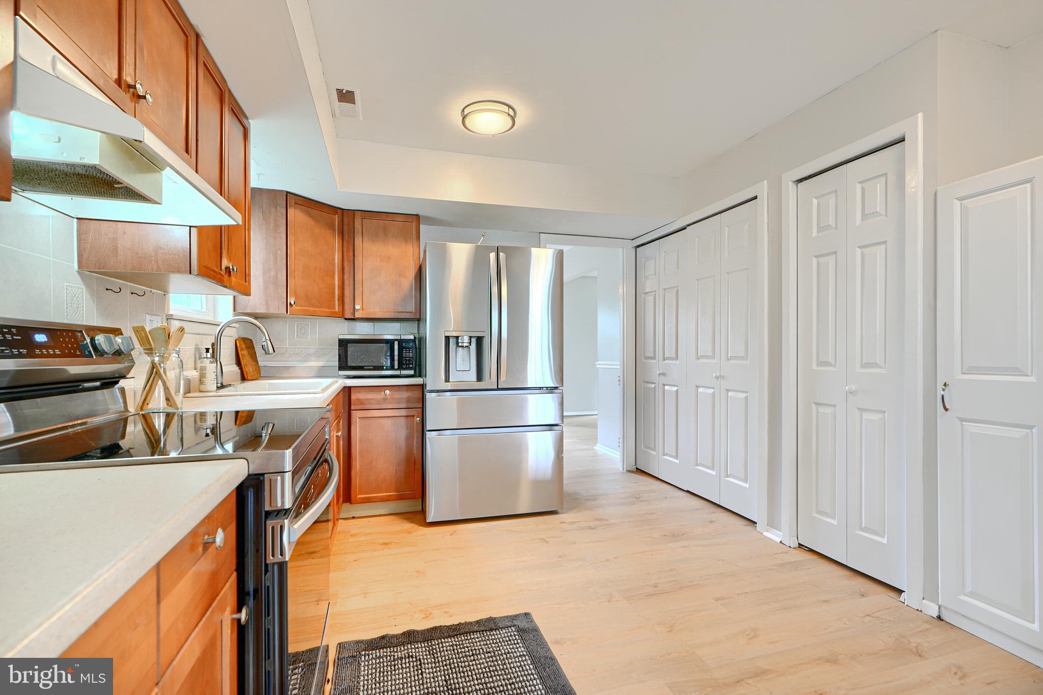 311 Laburnum Road Edgewood, MD 21040 - Photo 12 of 40 a kitchen with stainless steel appliances granite countertop a refrigerator and a stove