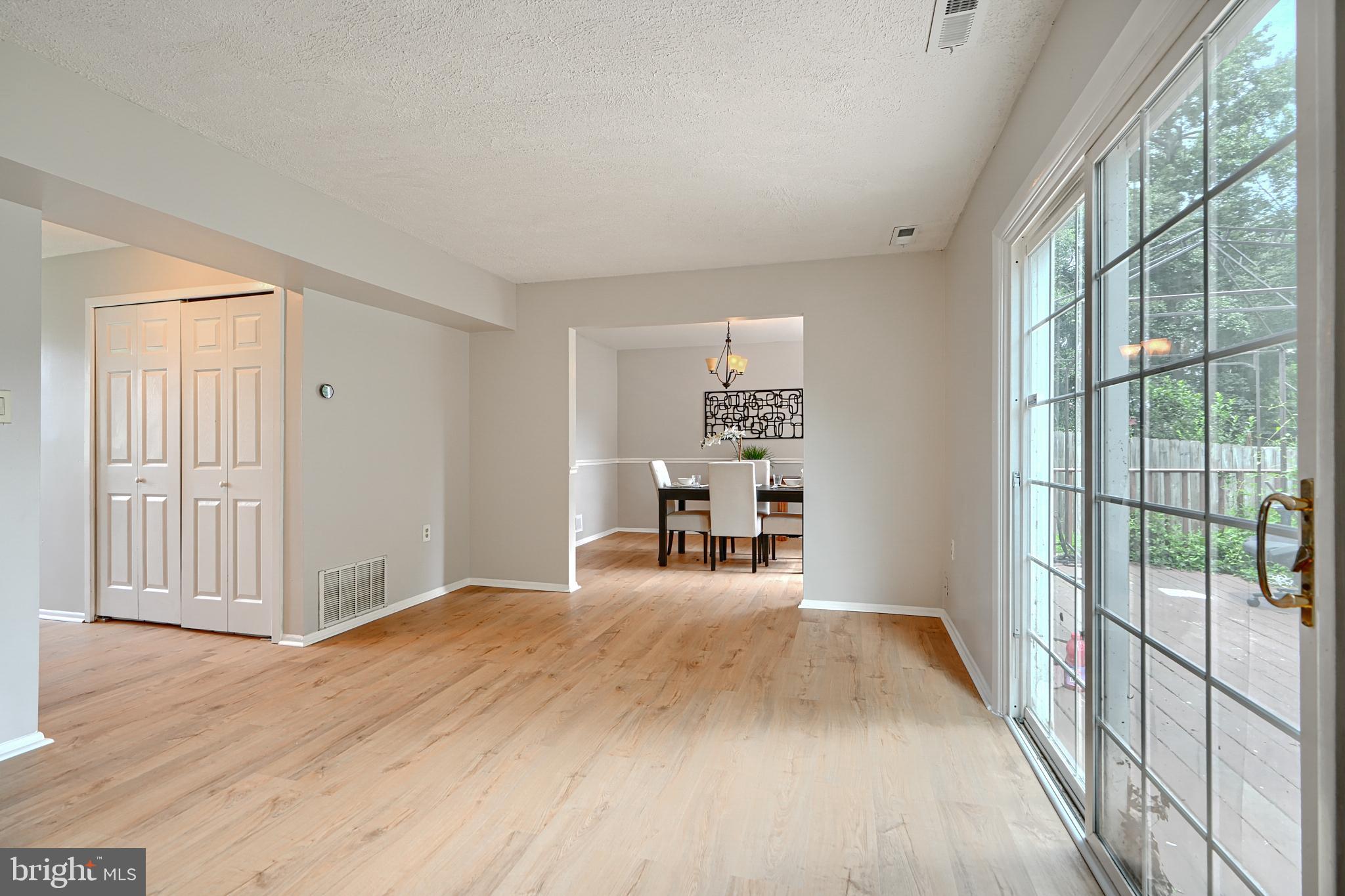311 Laburnum Road Edgewood, MD 21040 - Photo 22 of 40 a big room with wooden floor and natural light