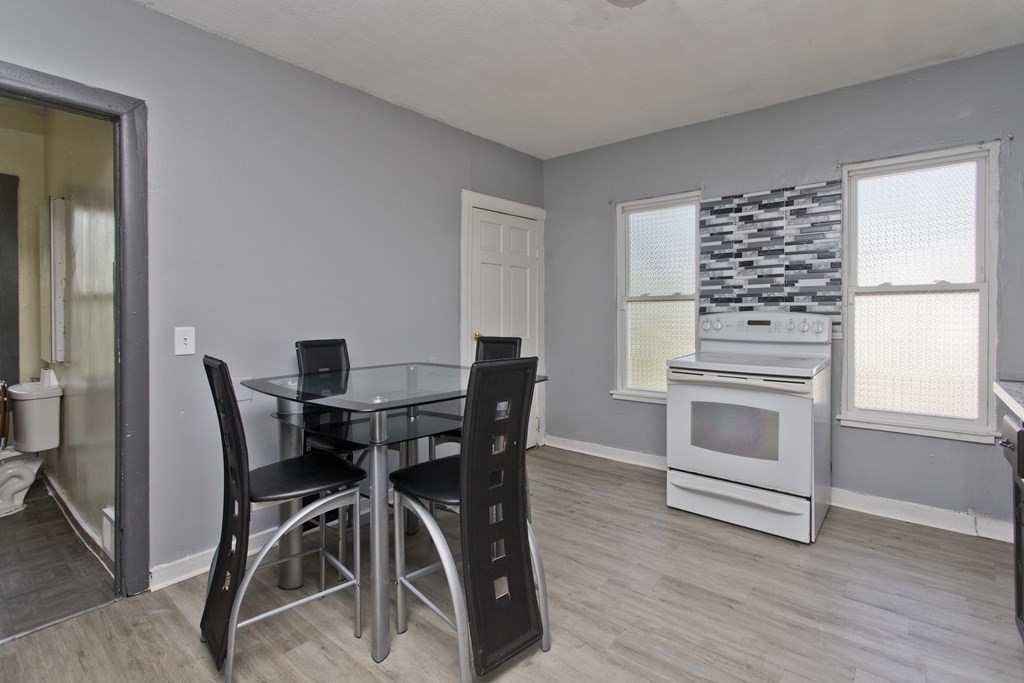 16 Nelson Avenue Springfield, MA 01109 - Photo 14 of 33 a view of a dining room with furniture and wooden floor