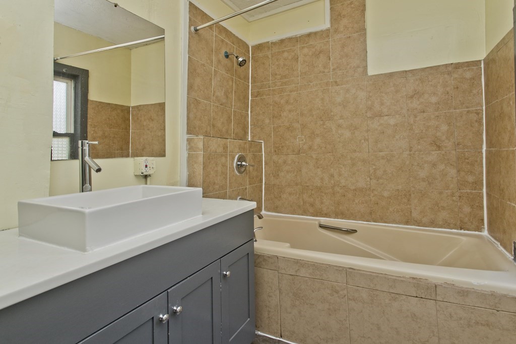 16 Nelson Avenue Springfield, MA 01109 - Photo 17 of 33 a bathroom with a sink and a bathtub