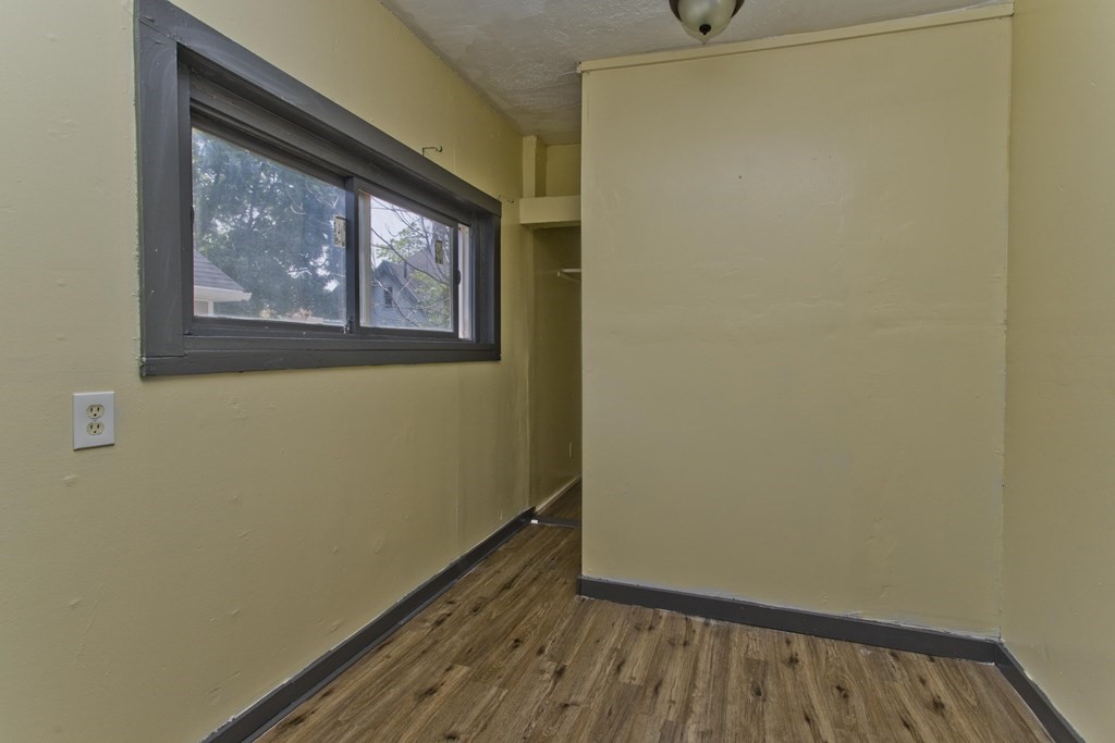 16 Nelson Avenue Springfield, MA 01109 - Photo 23 of 33 a view of wooden floor and wardrobe