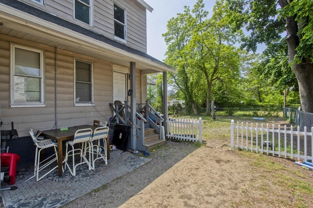 16 Nelson Avenue Springfield, MA 01109 - Photo 6 of 33 a view of a house with backyard and a sitting area
