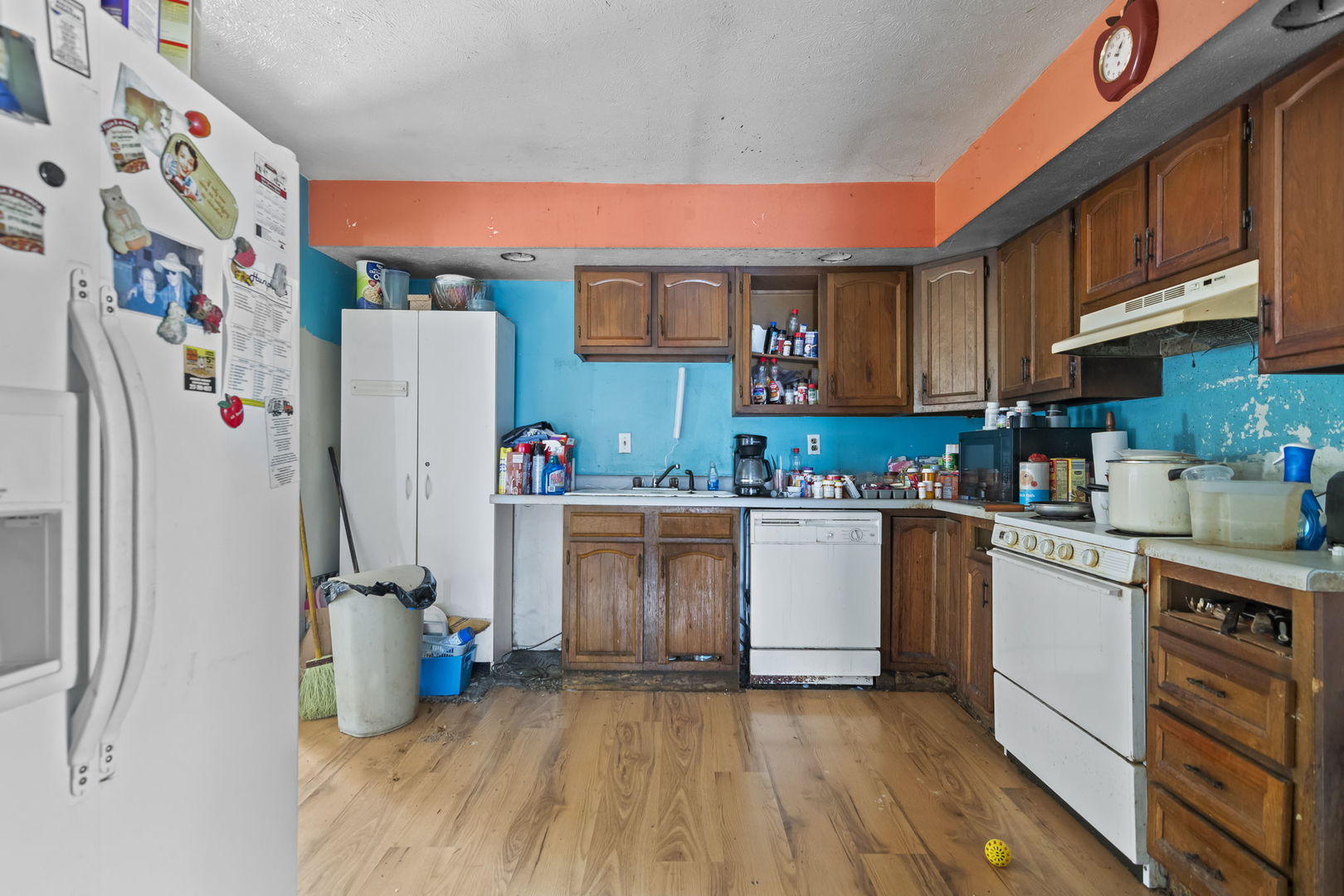 2837 South 13th Street Springfield, IL 62703 - Photo 5 of 14 a kitchen with a refrigerator and a stove