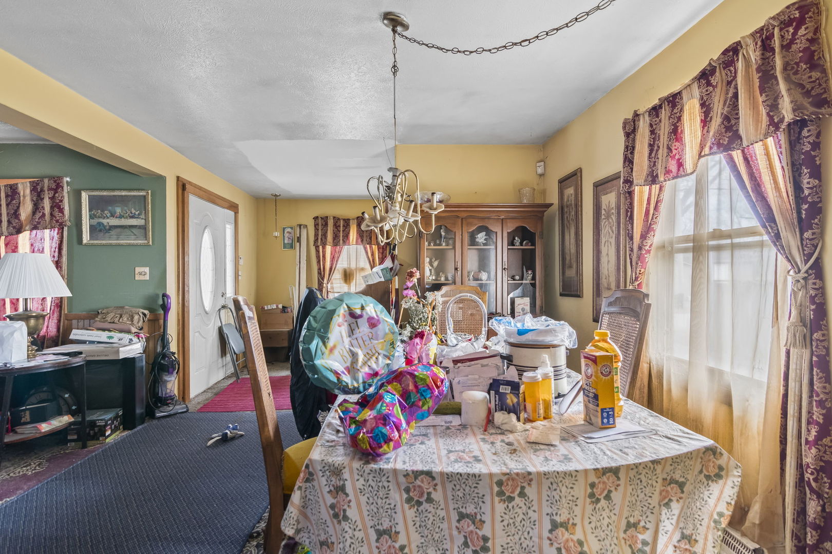2837 South 13th Street Springfield, IL 62703 - Photo 7 of 14 a view of a dining room with furniture one side kitchen view