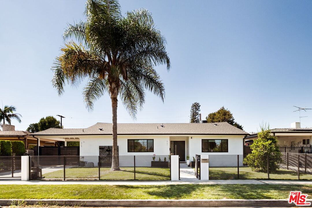6151 Atoll Avenue Valley Glen, CA 91401 - Photo 3 of 58 a front view of multiple houses with yard