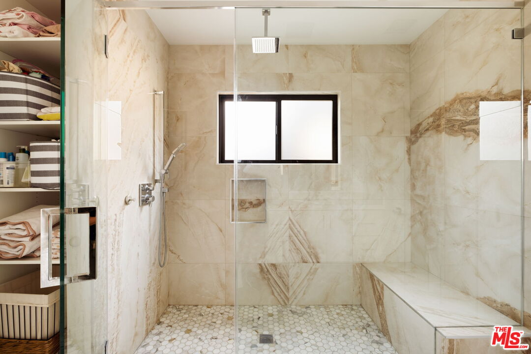 6151 Atoll Avenue Valley Glen, CA 91401 - Photo 31 of 58 a bathroom with a bathtub and shower