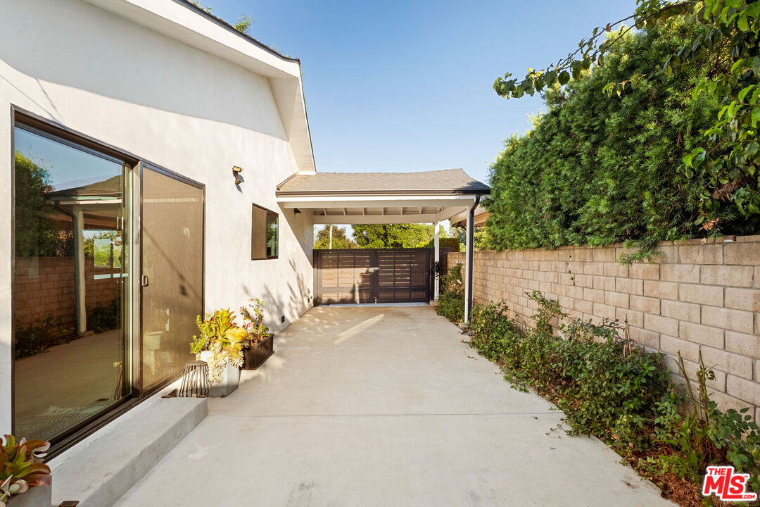 6151 Atoll Avenue Valley Glen, CA 91401 - Photo 54 of 58 a lobby with chair and glass door