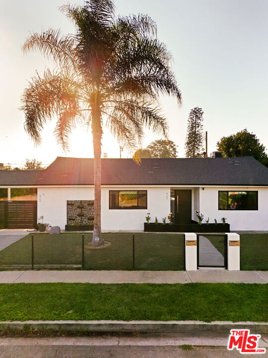 6151 Atoll Avenue Valley Glen, CA 91401 - Photo 58 of 58 a front view of house with yard and seating space