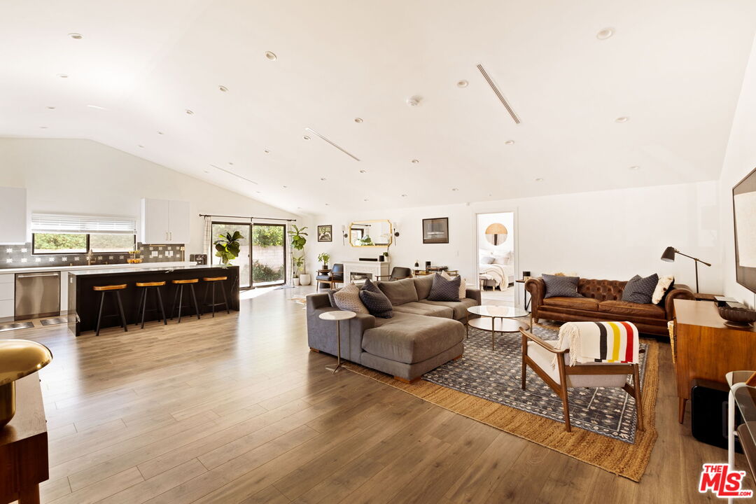 6151 Atoll Avenue Valley Glen, CA 91401 - Photo 6 of 58 a living room with furniture and view kitchen