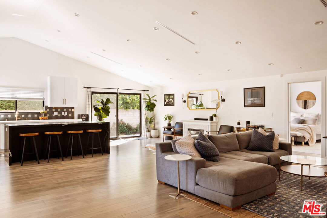6151 Atoll Avenue Valley Glen, CA 91401 - Photo 7 of 58 a living room with furniture and wooden floor