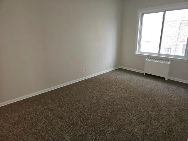 an empty room with a window