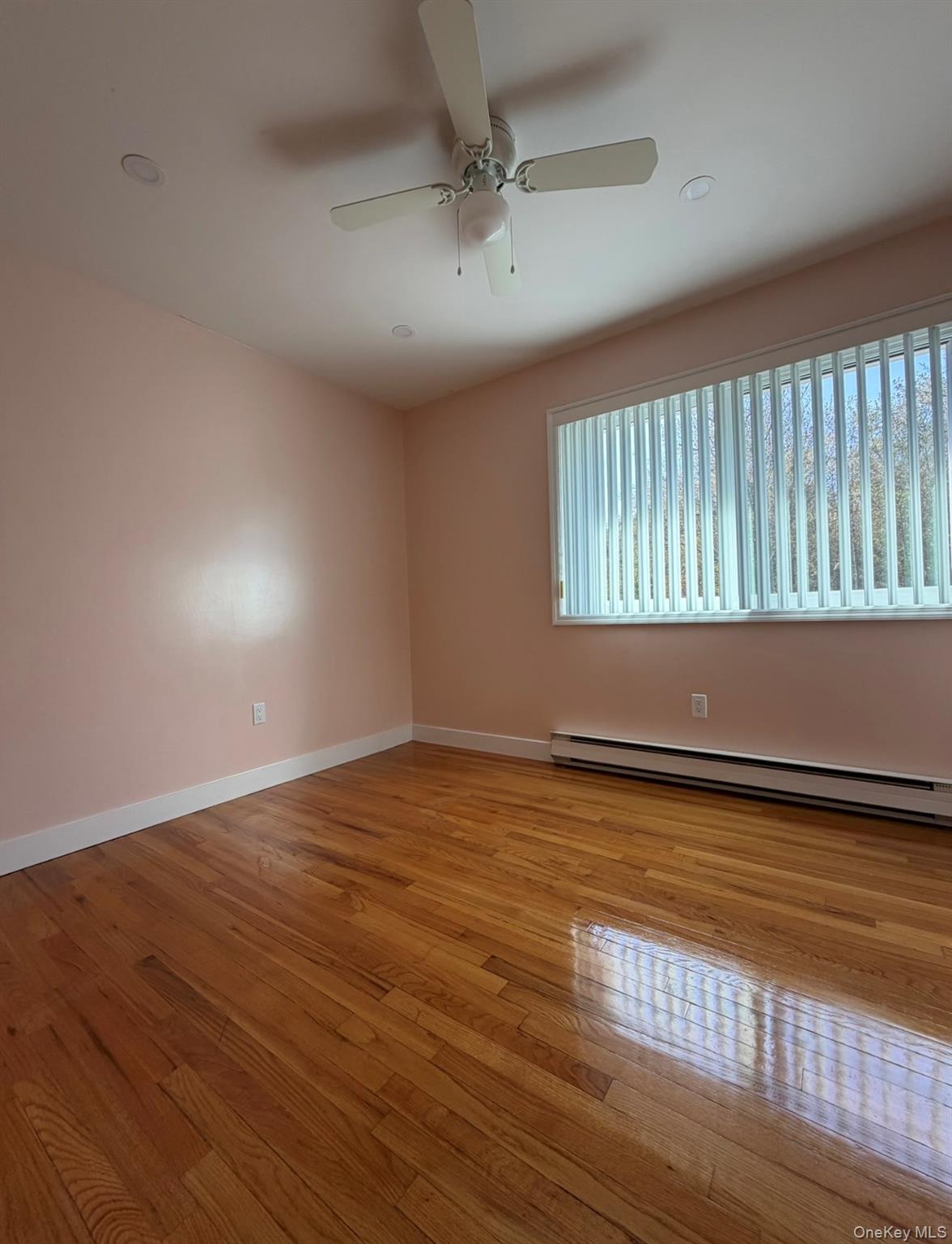 60 Medallion Road Kiamesha Lake, NY 12751 - Photo 31 of 44 an empty room with wooden floor and windows