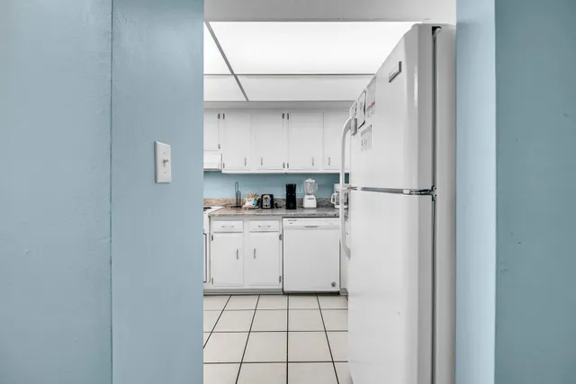 a view of an chairs and table in the patio