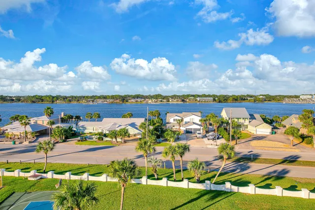 a view of a chairs and table in the patio