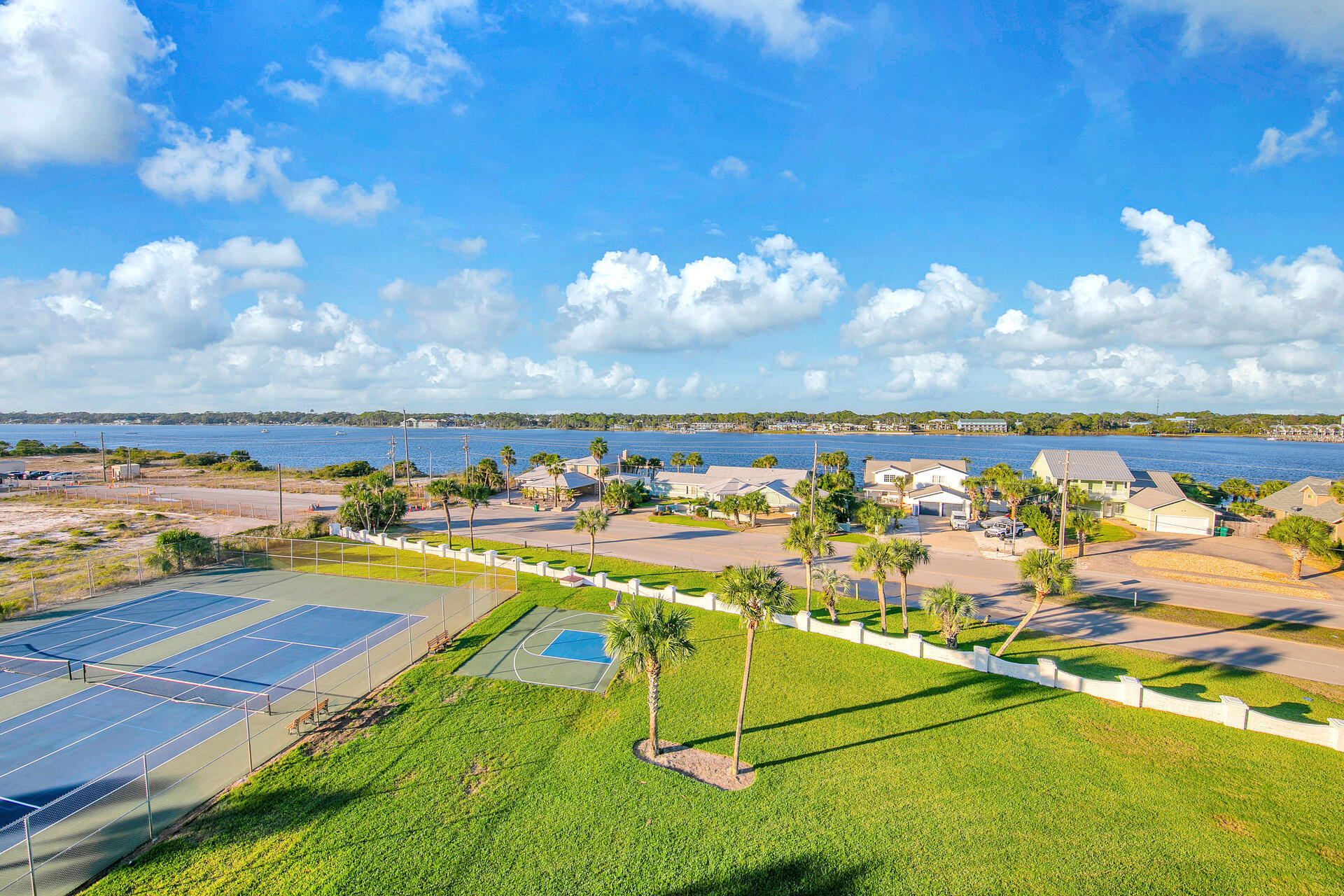 909 Santa Rosa Boulevard, Unit 561 Fort Walton Beach, FL 32548 - Photo 48 of 61 a view of a swimming pool with an ocean view