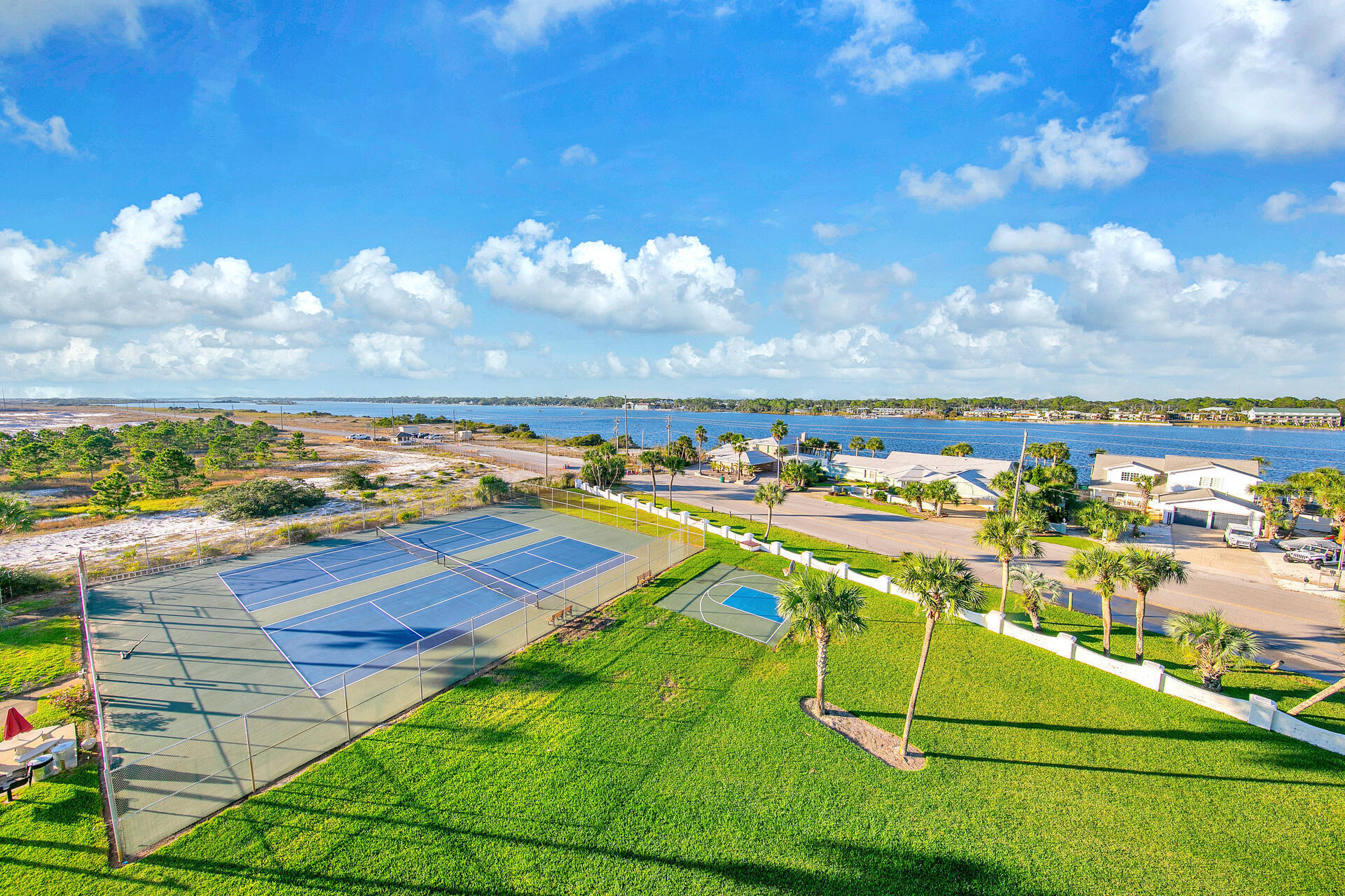 909 Santa Rosa Boulevard, Unit 561 Fort Walton Beach, FL 32548 - Photo 49 of 61 a view of a tennis court