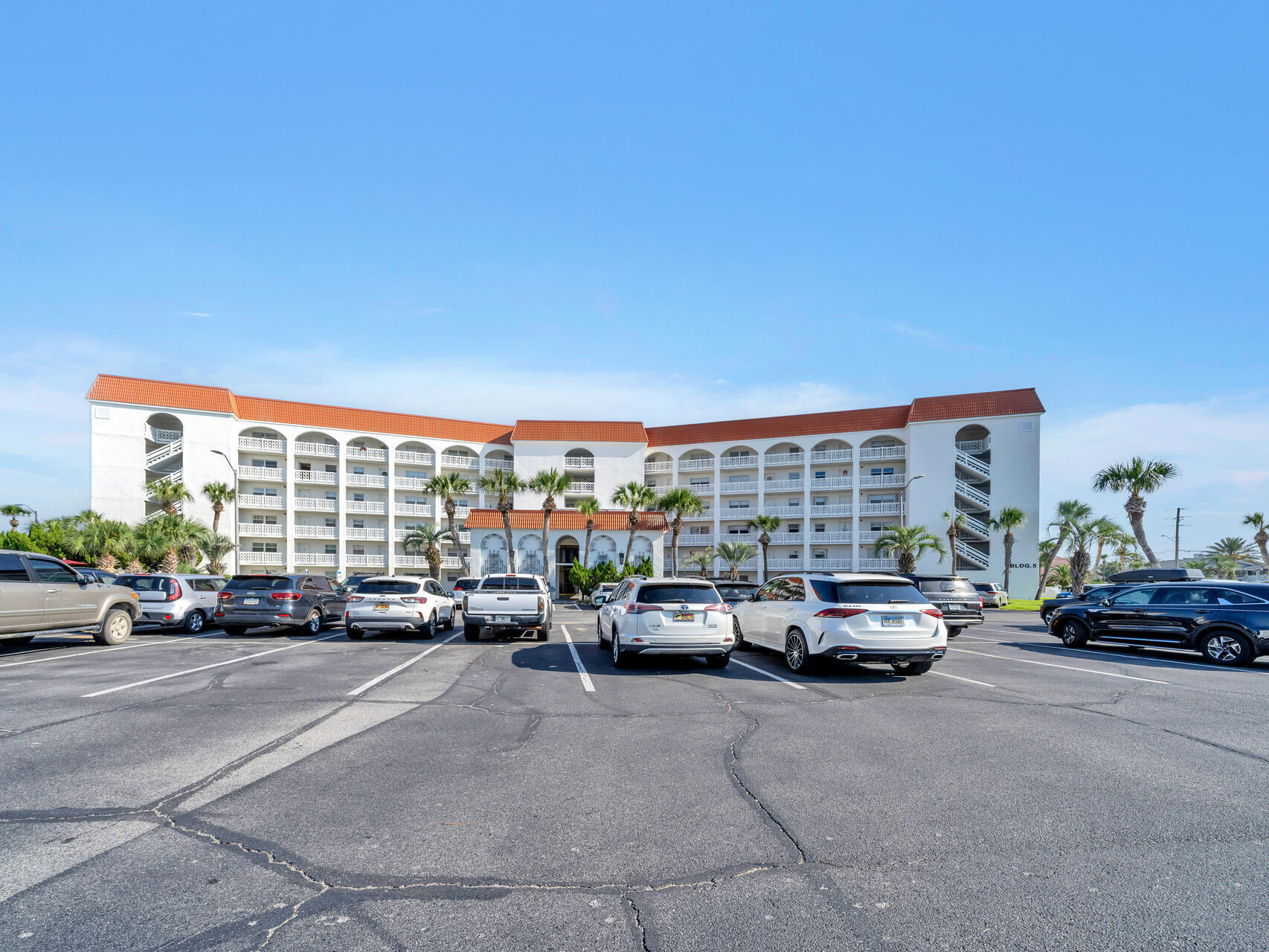 909 Santa Rosa Boulevard, Unit 561 Fort Walton Beach, FL 32548 - Photo 50 of 61 a car parked in front of a building