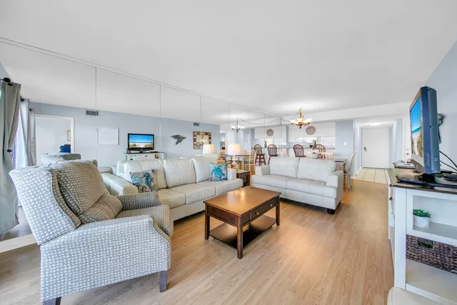 a living room with furniture or couch and a flat screen tv