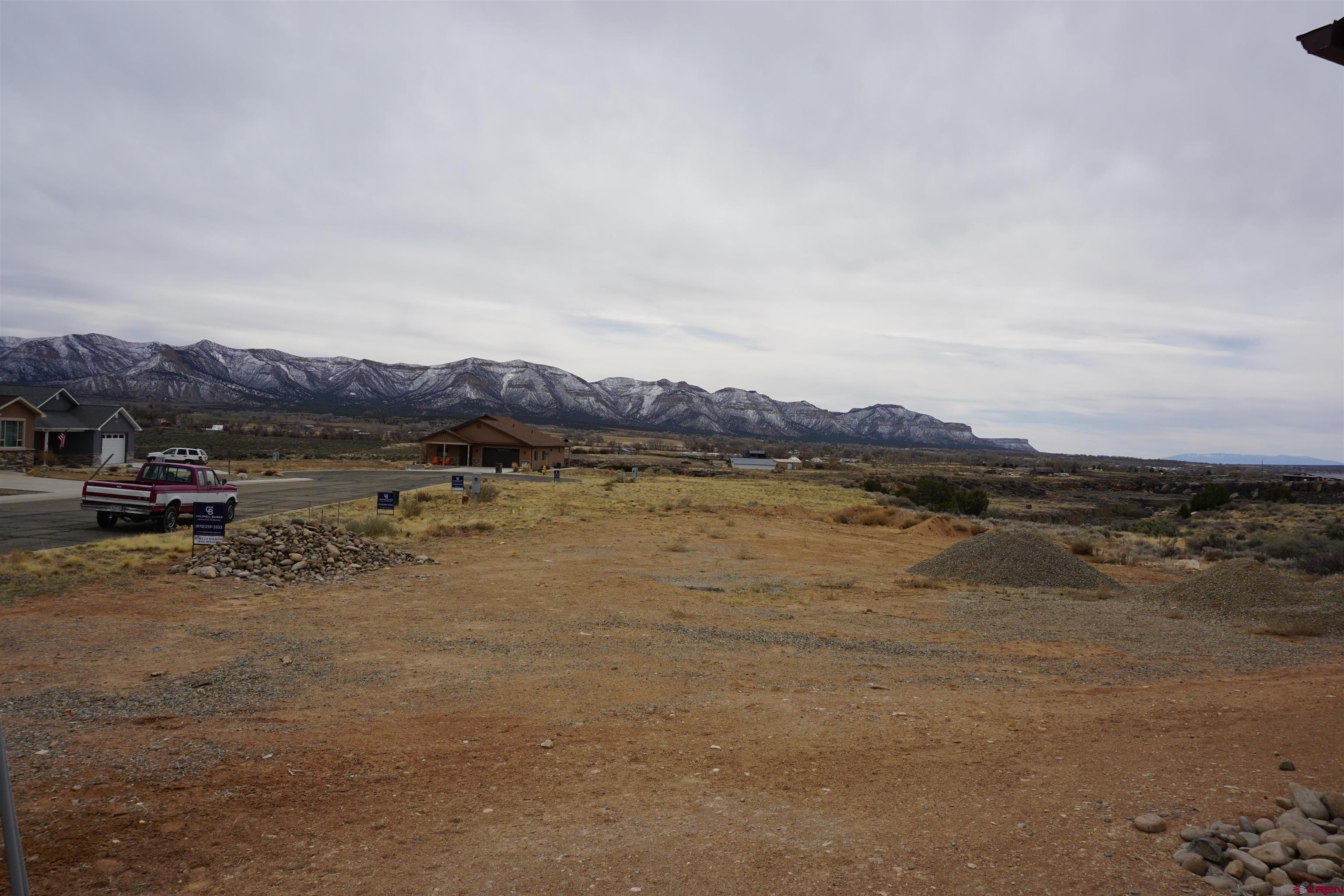 1109 Bluffs Boulevard Cortez, CO 81321 - Photo 4 of 8 a view of lake with mountain
