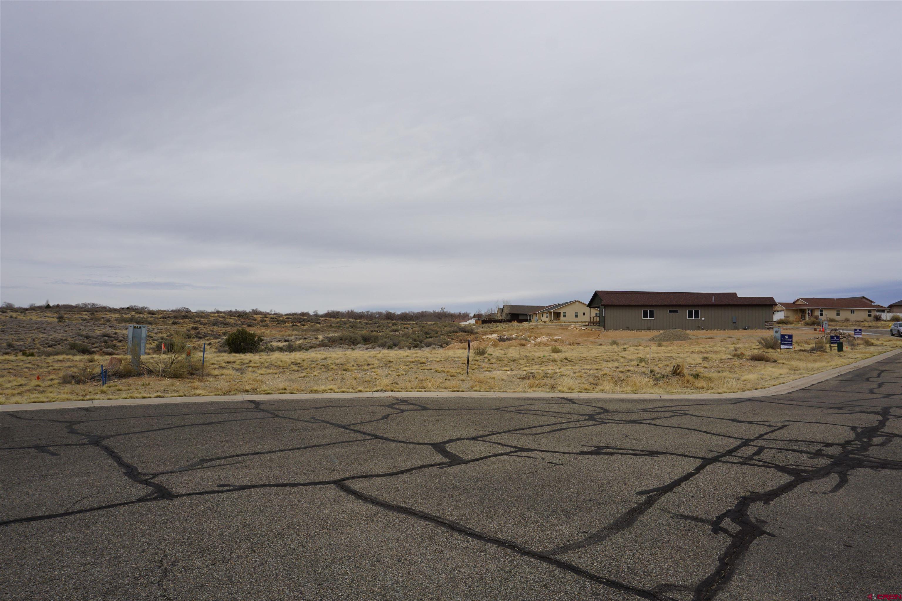 1109 Bluffs Boulevard Cortez, CO 81321 - Photo 6 of 8 a view of an ocean and beach