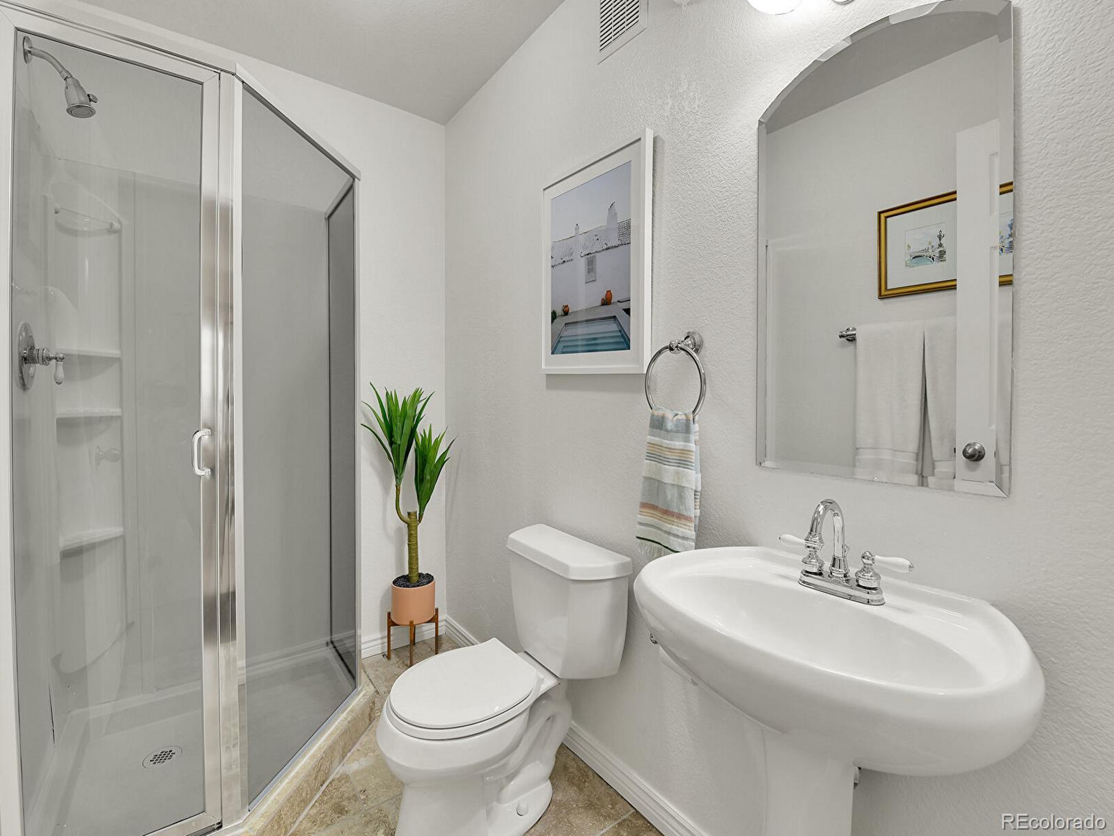 45 Jackson Street, Unit D Denver, CO 80206 - Photo 21 of 29 a bathroom with a sink toilet and shower