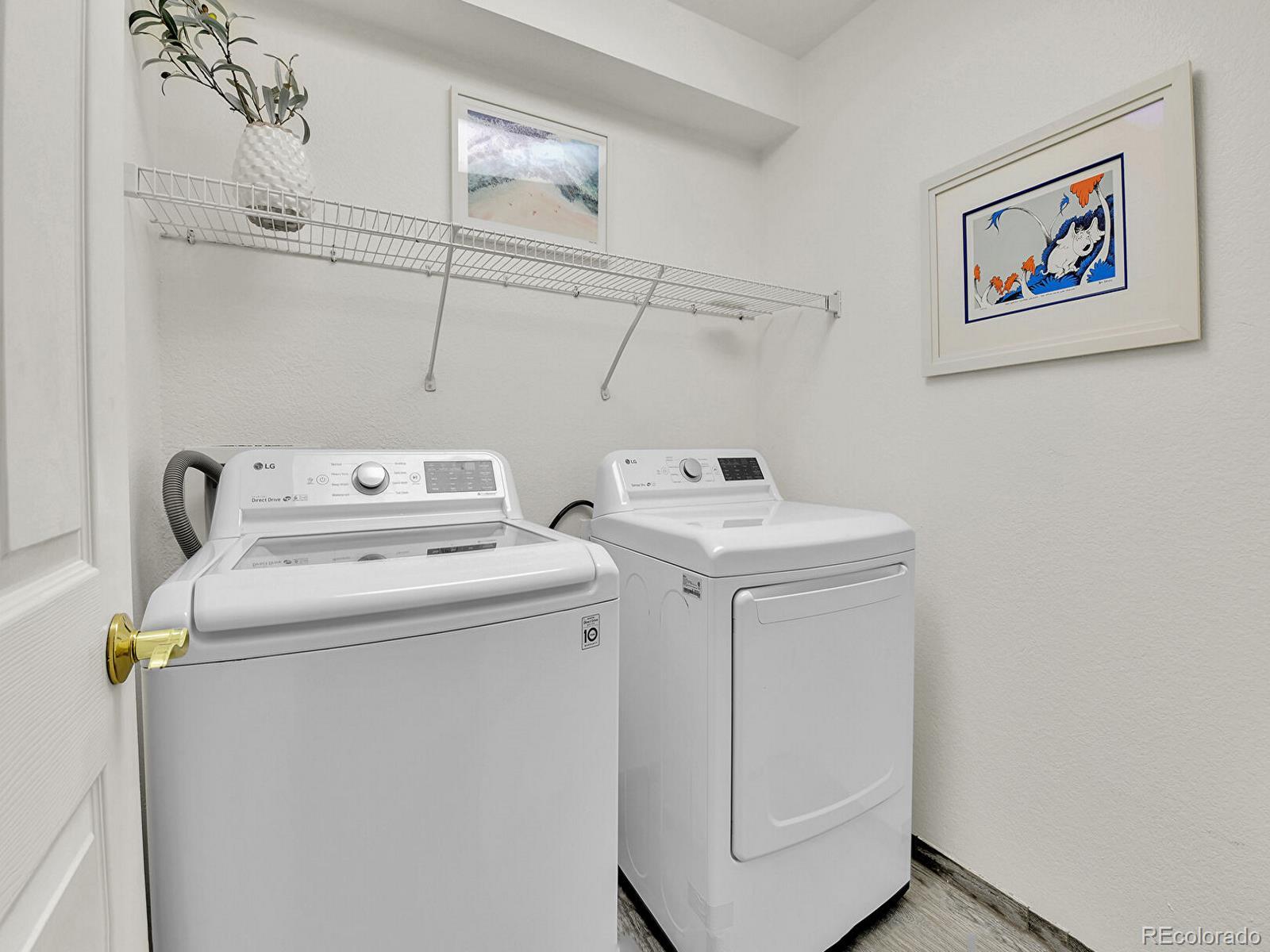 45 Jackson Street, Unit D Denver, CO 80206 - Photo 24 of 29 a utility room with dryer and washer