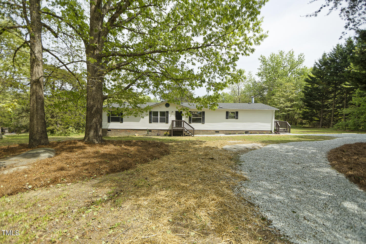 3820 Morton-Pulliam Road Roxboro, NC 27574 - Photo 2 of 37 a house view with a trees