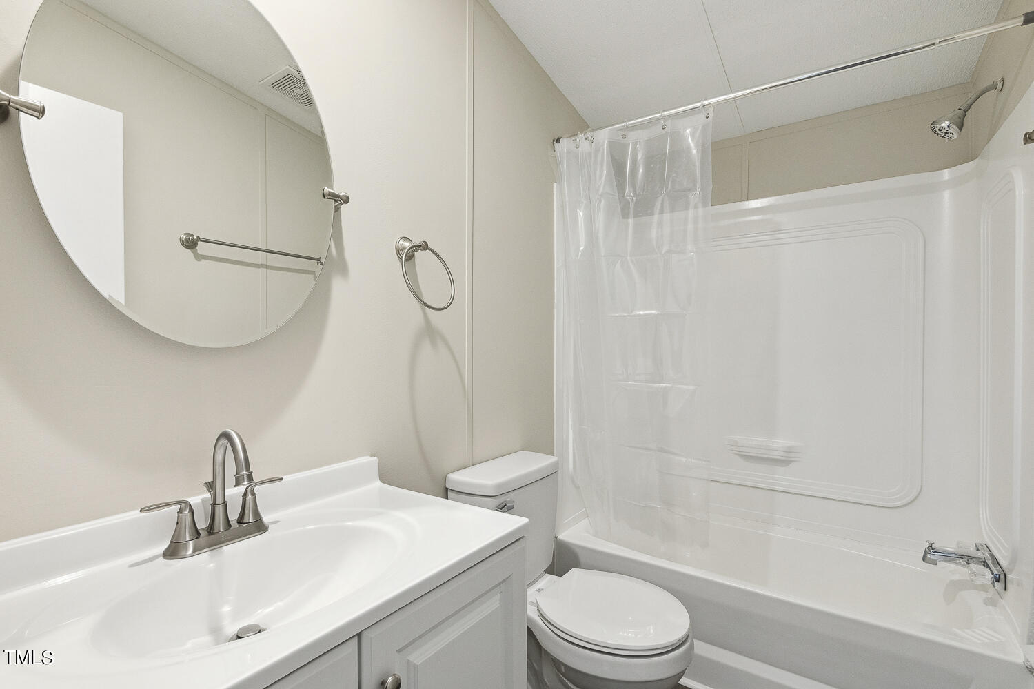 3820 Morton-Pulliam Road Roxboro, NC 27574 - Photo 29 of 37 a bathroom with a sink a toilet and shower