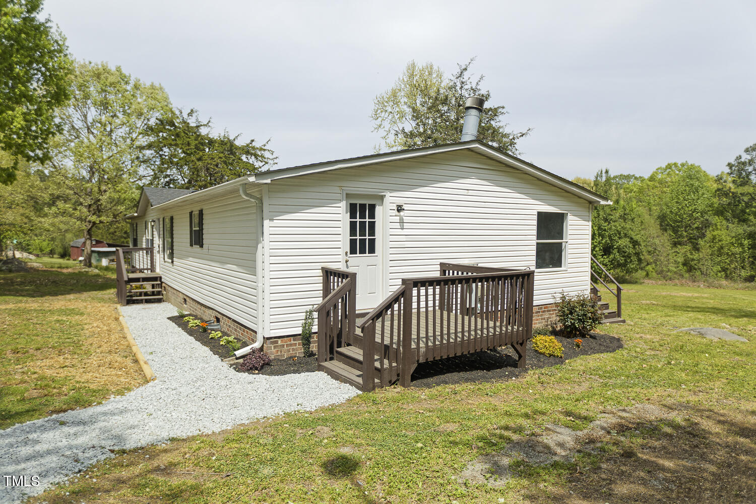 3820 Morton-Pulliam Road Roxboro, NC 27574 - Photo 4 of 37 a view of a house with a yard and sitting area