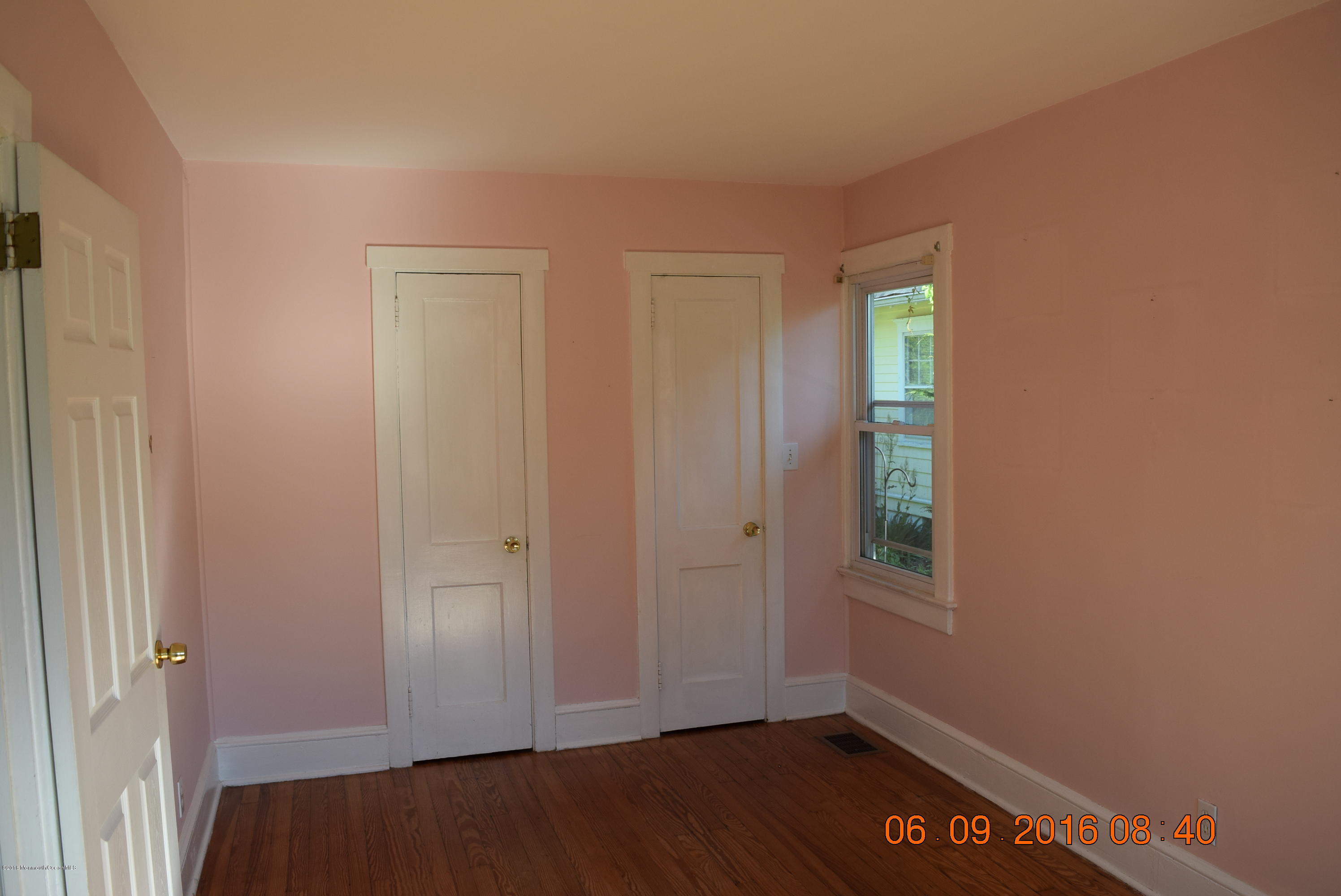 807 Ridge Avenue Neptune City, NJ 07753 - Photo 11 of 15 wooden floor in an empty room