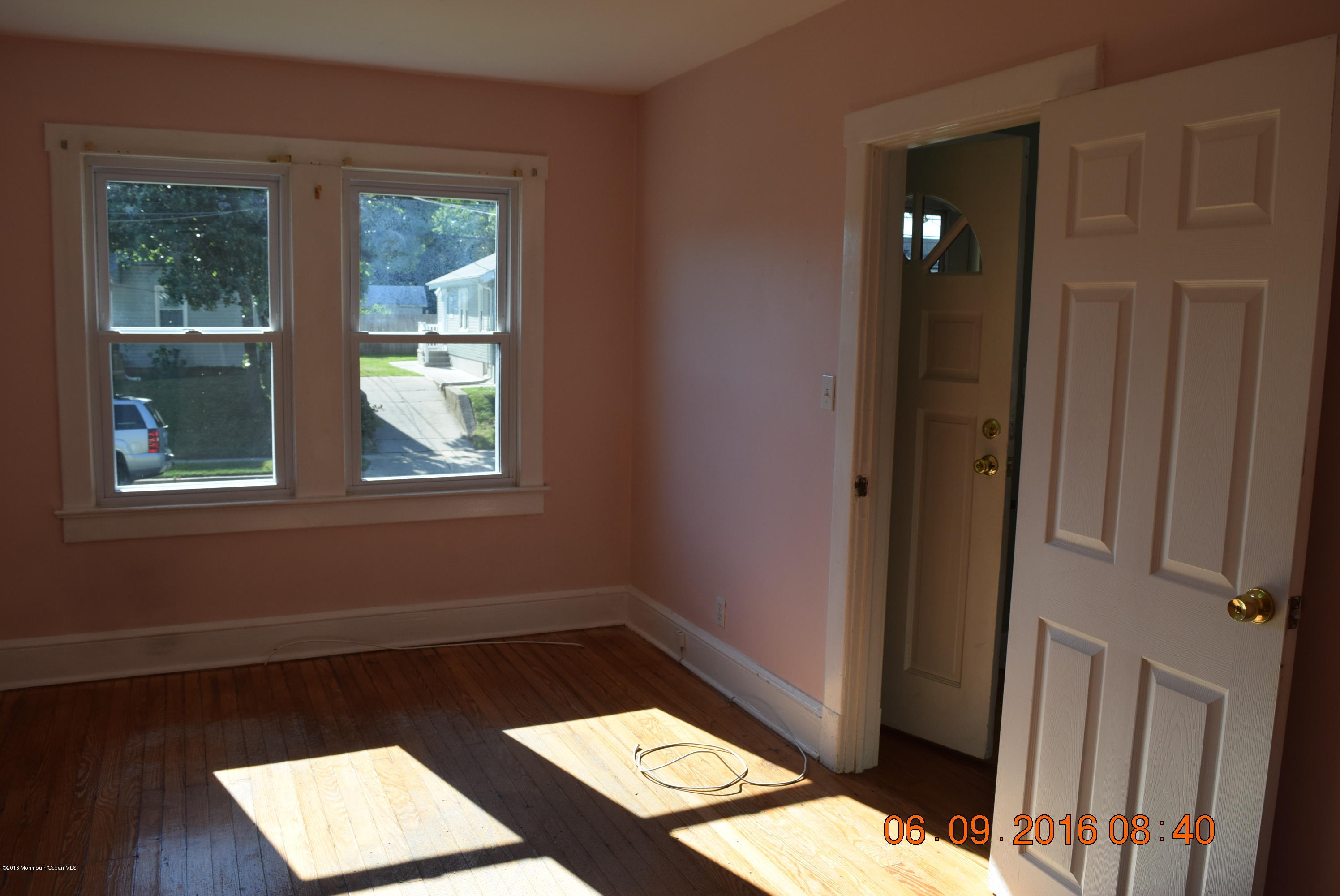 807 Ridge Avenue Neptune City, NJ 07753 - Photo 12 of 15 a view of an empty room and window
