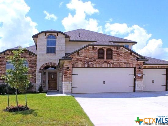 830 TUSCAN Road Harker Heights, TX 76548 - Photo 1 of 1 a front view of a house with a yard