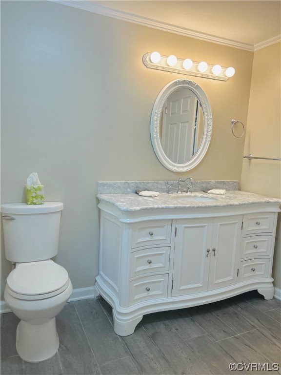 4416 Treely Road Chester, VA 23831 - Photo 15 of 22 a bathroom with a toilet a sink and a mirror