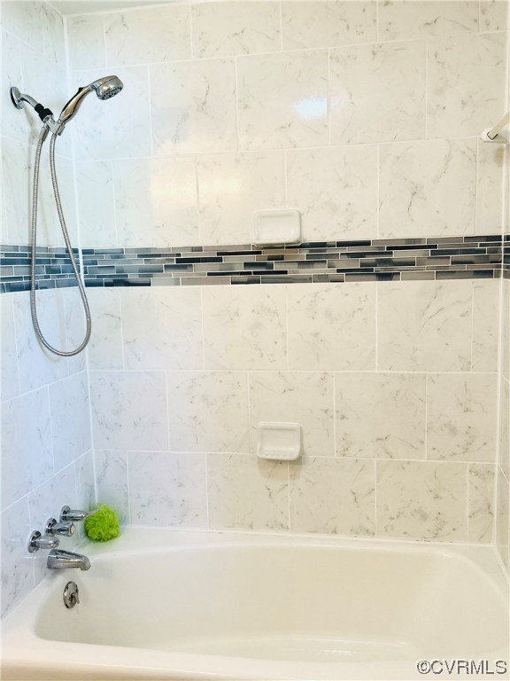 4416 Treely Road Chester, VA 23831 - Photo 16 of 22 a bathroom with a bathtub and a shower