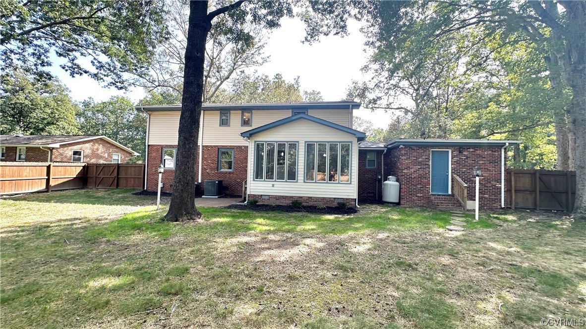 4416 Treely Road Chester, VA 23831 - Photo 22 of 22 a view of a house with a yard and a large tree