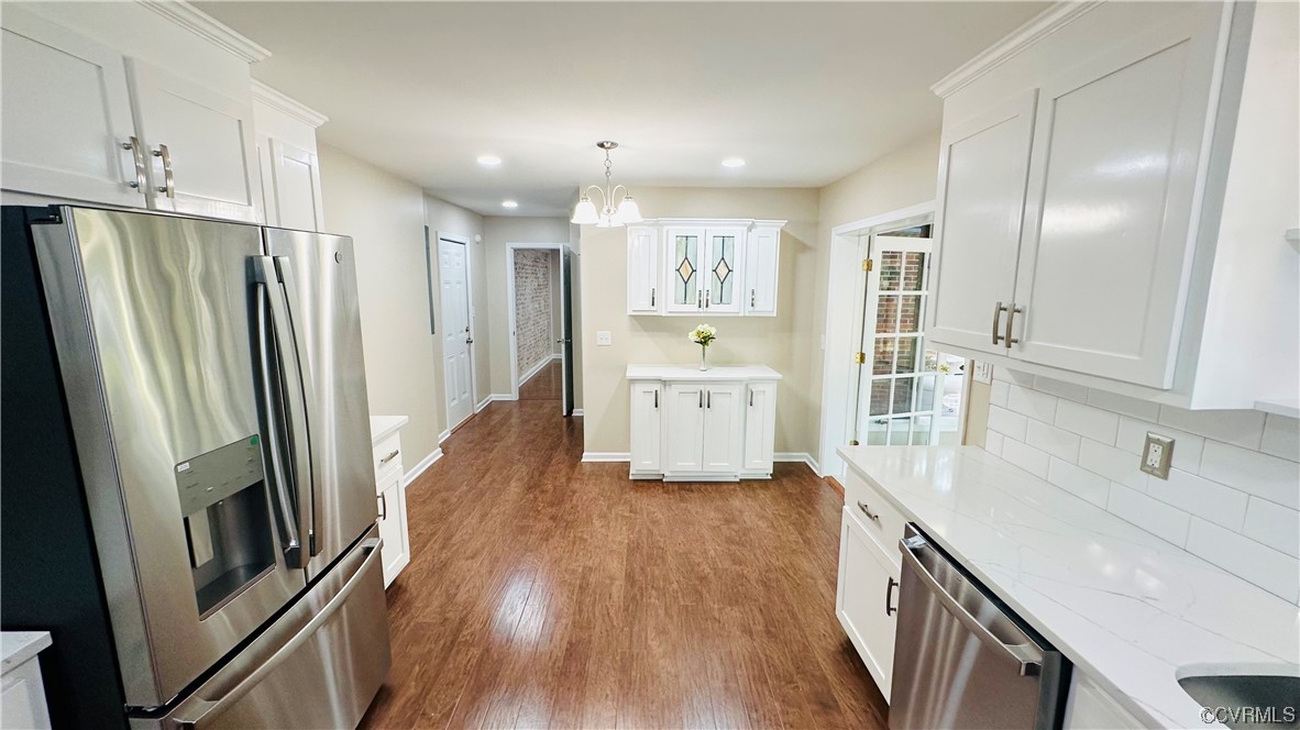 4416 Treely Road Chester, VA 23831 - Photo 7 of 22 a kitchen with stainless steel appliances a refrigerator and a sink